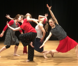 Olga Dunn Dance Company contemporary dancers dynamically moving on the Saint James Place stage