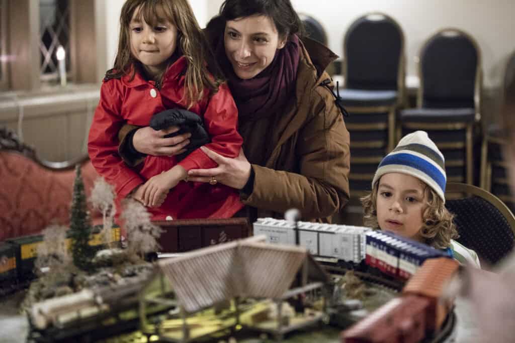 charlies trains mom holding daughter