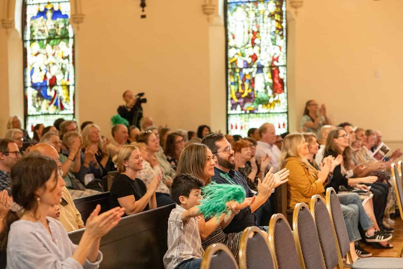 People enjoying the Berkshire Children's Chorus at Saint James Place